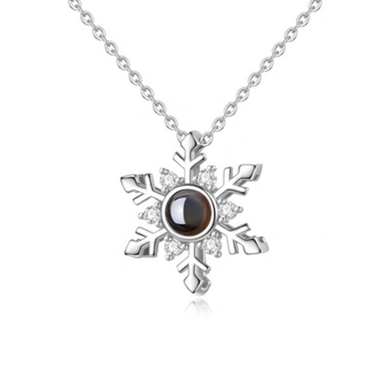 "100 Languages 'I Love You' Snowflake Necklace, featuring a nano projection pendant. Perfect for Valentine's or birthday gifts."