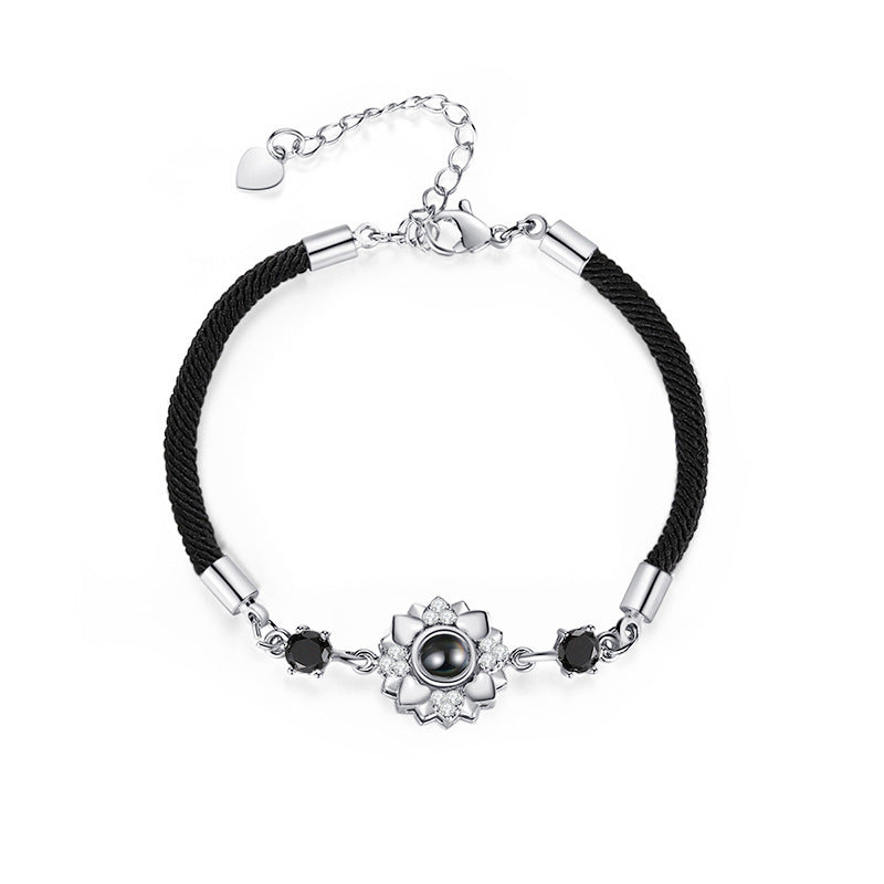 Customizable couple projection bracelets with braided design, perfect as a personalized gift.