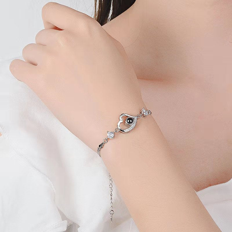 "100 Languages 'I Love You' Projection Bracelet – a perfect gift for your girlfriend, ideal for birthdays or special occasions."