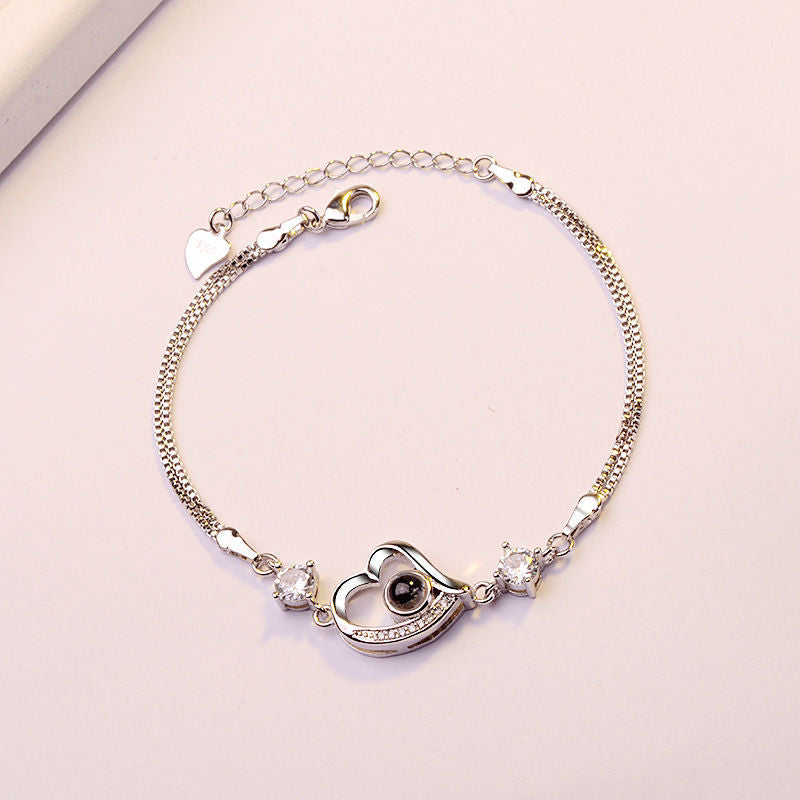 "100 Languages 'I Love You' Projection Bracelet – a perfect gift for your girlfriend, ideal for birthdays or special occasions."