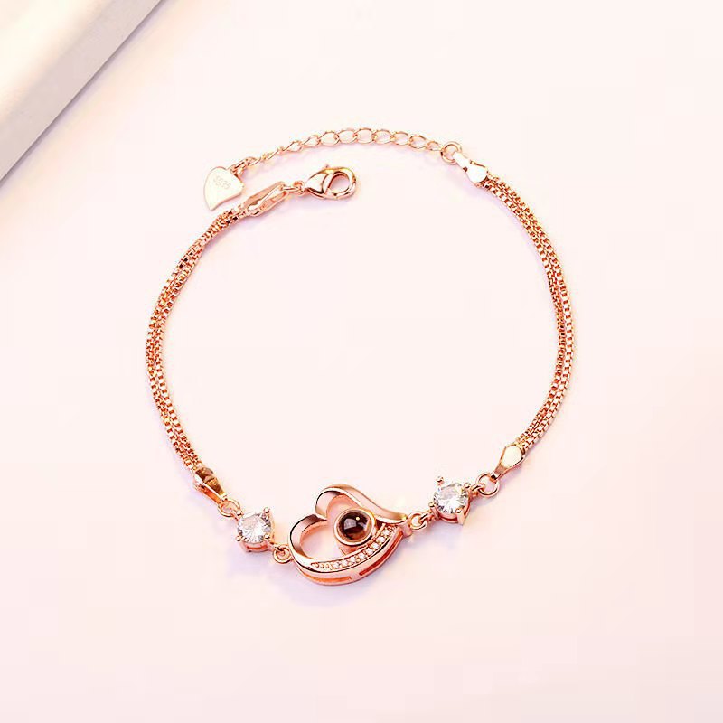 "100 Languages 'I Love You' Projection Bracelet – a perfect gift for your girlfriend, ideal for birthdays or special occasions."
