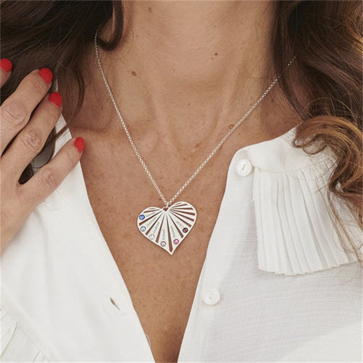 Women's diamond collarbone necklace with name lettering and peach heart design, perfect for MOM.