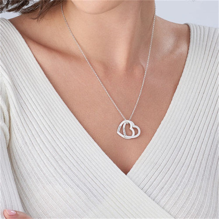 Sterling silver heart-shaped love pendant necklace with custom engraving and sparkling zircon. Trendy, versatile Korean style.