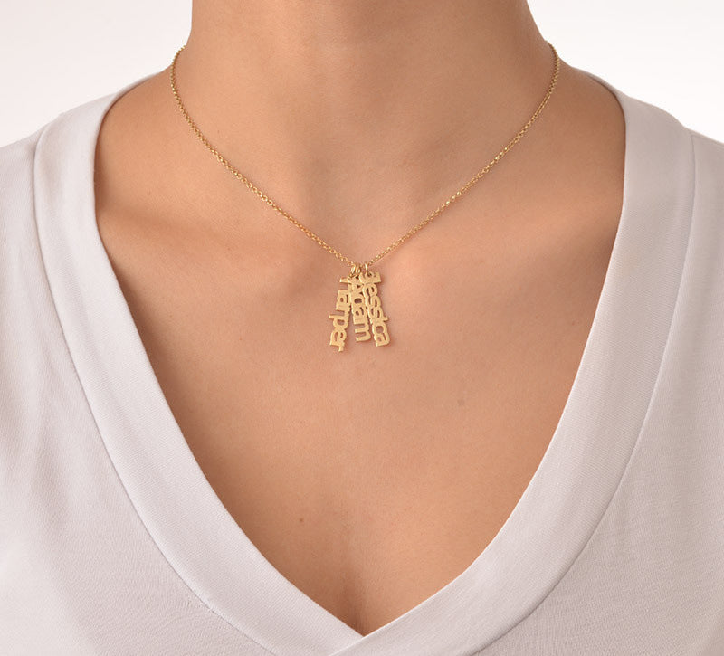 Jewelry trending in a: S925 silver-plated long strip name necklace in 18k gold, customizable with 1-3 names. Classic and simple design.