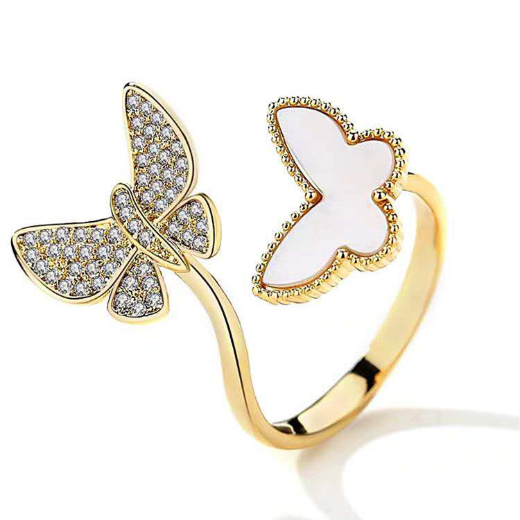 Stylish rhinestone double butterfly ring with an open adjustable design. Perfect for adding a unique, elegant touch to any look.