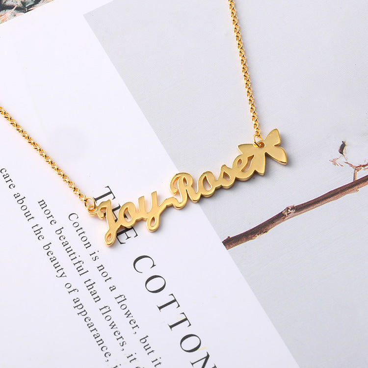Customizable name letter necklace in silver, featuring creative lettering design. Wholesale directly from the manufacturer.