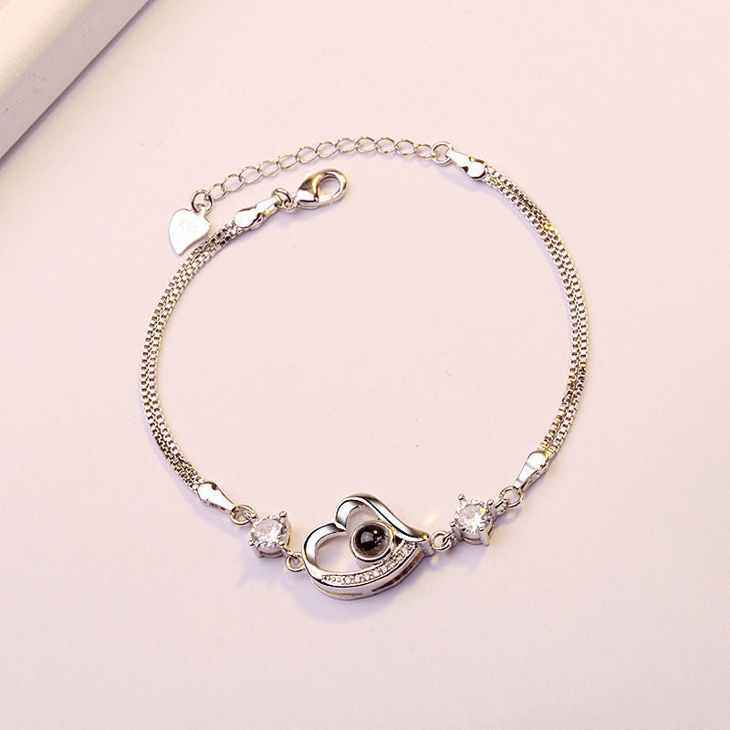 "100 Languages 'I Love You' Projection Bracelet – a perfect gift for your girlfriend, ideal for birthdays or special occasions."