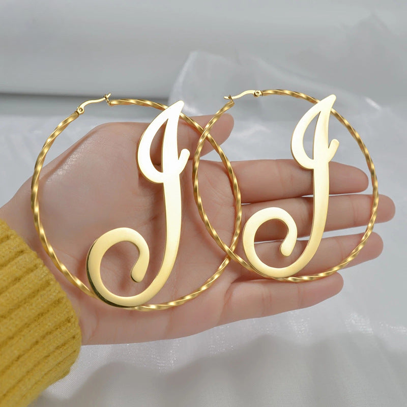 Personalized titanium steel letter name hoop earrings for women, original design, ideal gift on AliExpress.