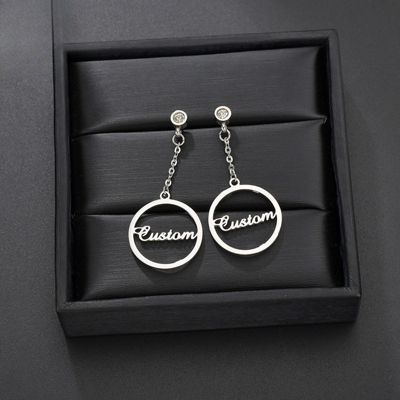 Trendy stainless steel letter name hoop earrings – bold and fashionable statement pieces.