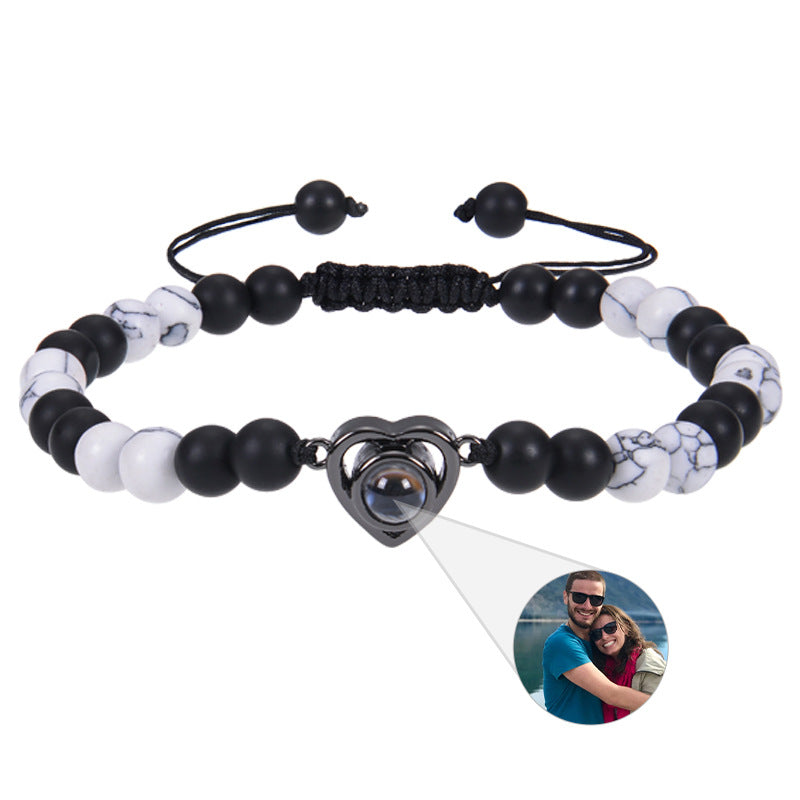 6mm black magnetic stone custom photo bracelet with matte finish and heart pendant projection.