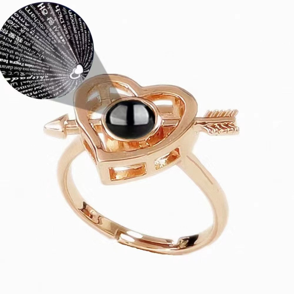 New heart-piercing projection ring with "I Love You" in 100 languages, customizable photo and text, perfect for Christmas gifts.