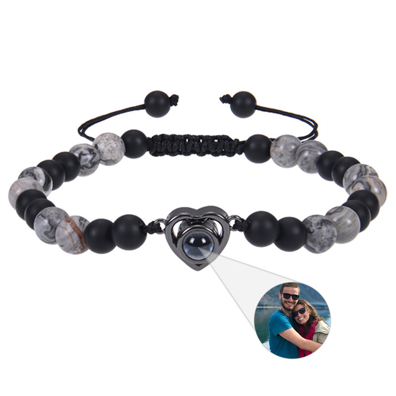 6mm black magnetic stone custom photo bracelet with matte finish and heart pendant projection.