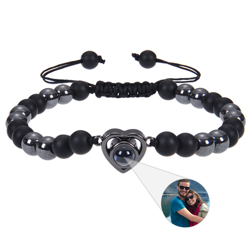 6mm black magnetic stone custom photo bracelet with matte finish and heart pendant projection.