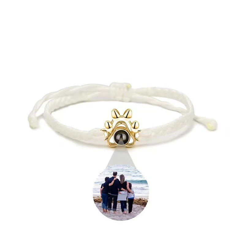 Dog paw projection bracelet for men and women, customizable with family photos and "I love you" in 100 languages.
