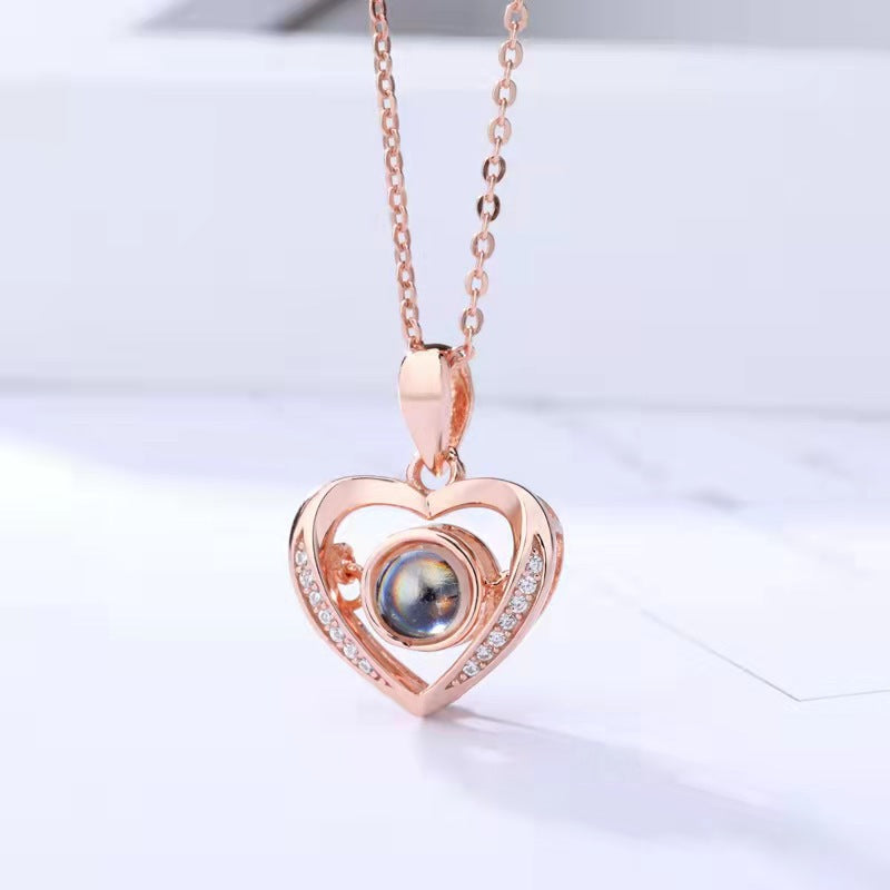 "100 Languages 'I Love You' Projection Necklace, trendy pendant, perfect Valentine's Day gift for her."