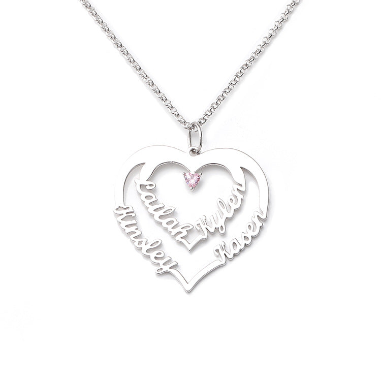 Custom geometric heart-shaped diamond necklace with creative lettering. Fashionable claw pendant on a silver chain, perfect for collarbone jewelry. Available for wholesale.