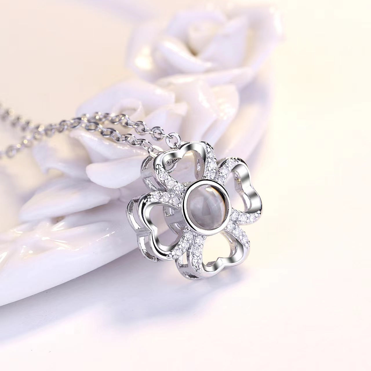 100 Languages "I Love You" Projection Necklace with custom photo and text. TikTok-inspired design.