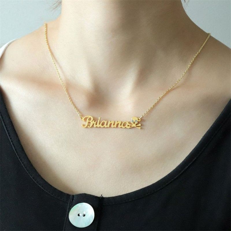 Crystal Skull Name Necklace with Pirate Design and Shimmering Eyes – Dazzling Jewelry.