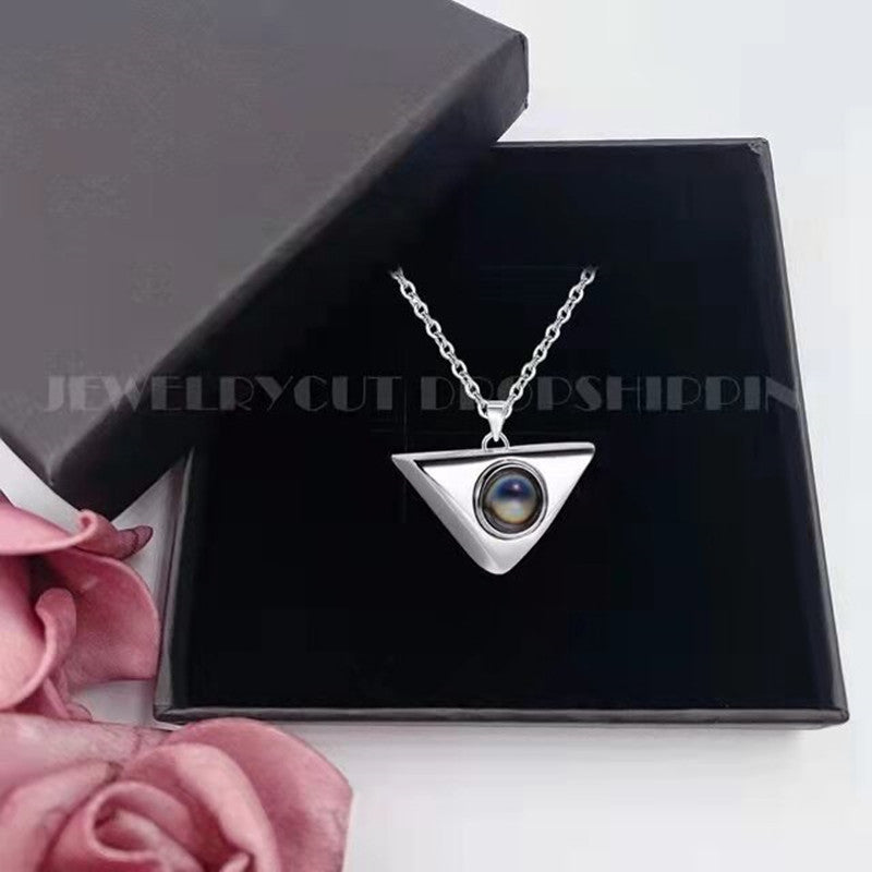 100 Languages "I Love You" Necklace with custom photo and text projection.