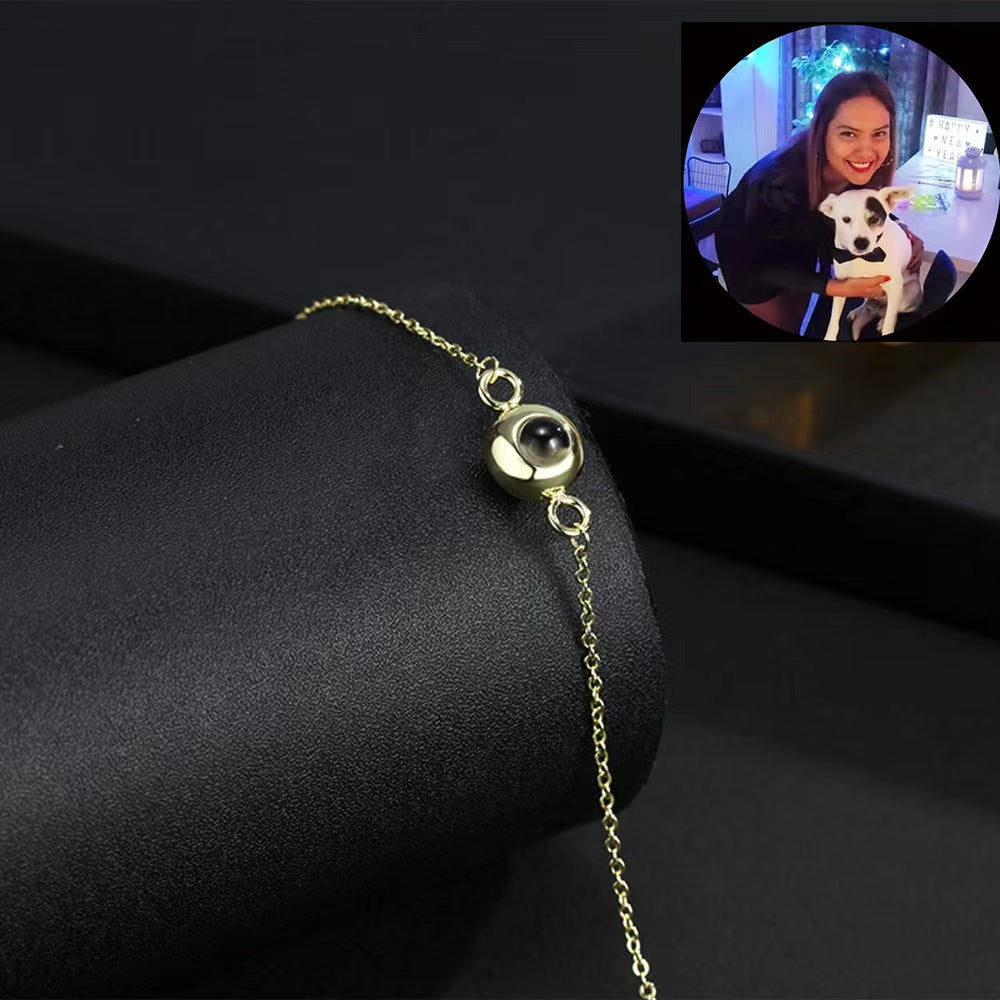 Nano projection stone bracelet featuring "I love you" in 100 languages, customizable with photo engraving.