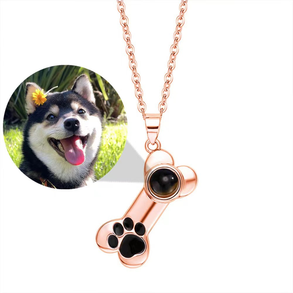 100 Languages "I Love You" projection bone necklace with dog paw design, perfect pet-themed Christmas gift.