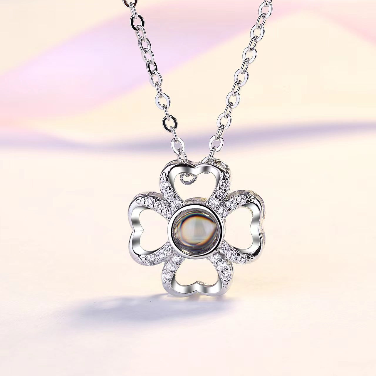 100 Languages "I Love You" Projection Necklace with custom photo and text. TikTok-inspired design.