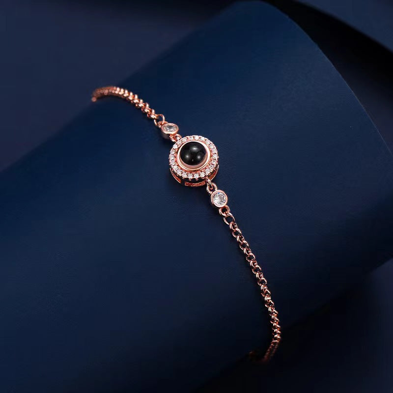 Best-selling round zirconia bracelet with "I love you" in 100 languages, featuring high-definition photo projection.