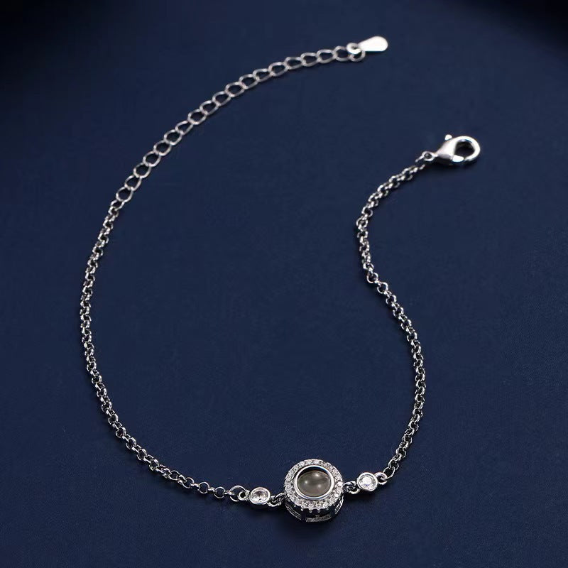 Best-selling round zirconia bracelet with "I love you" in 100 languages, featuring high-definition photo projection.
