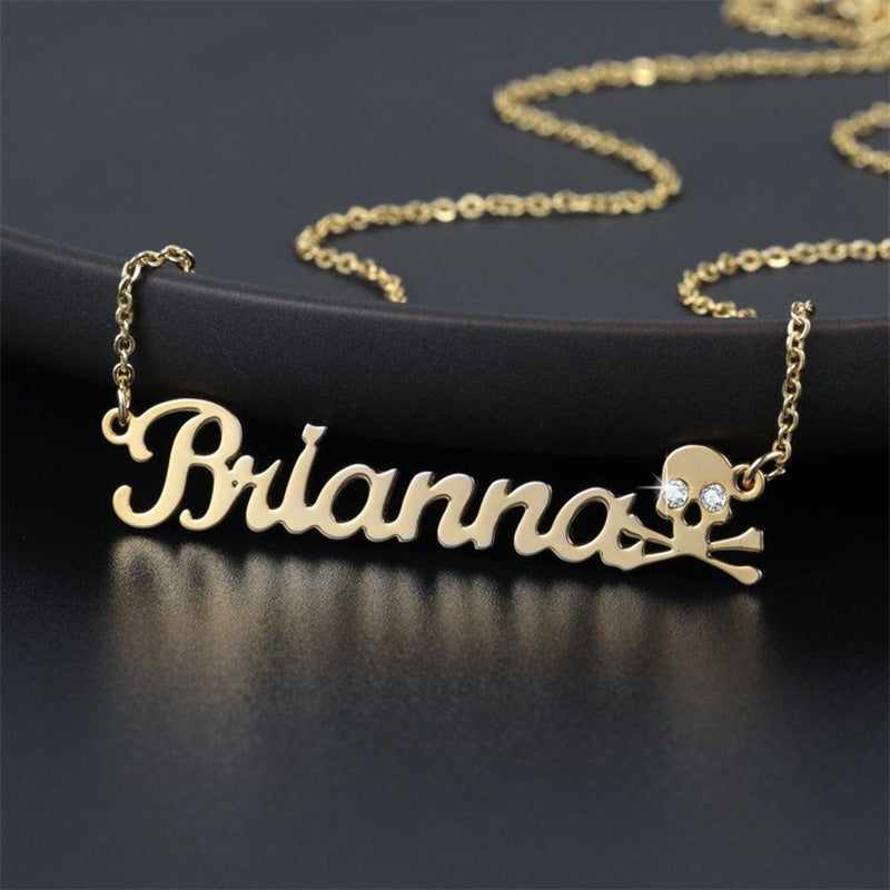 Crystal Skull Name Necklace with Pirate Design and Shimmering Eyes – Dazzling Jewelry.