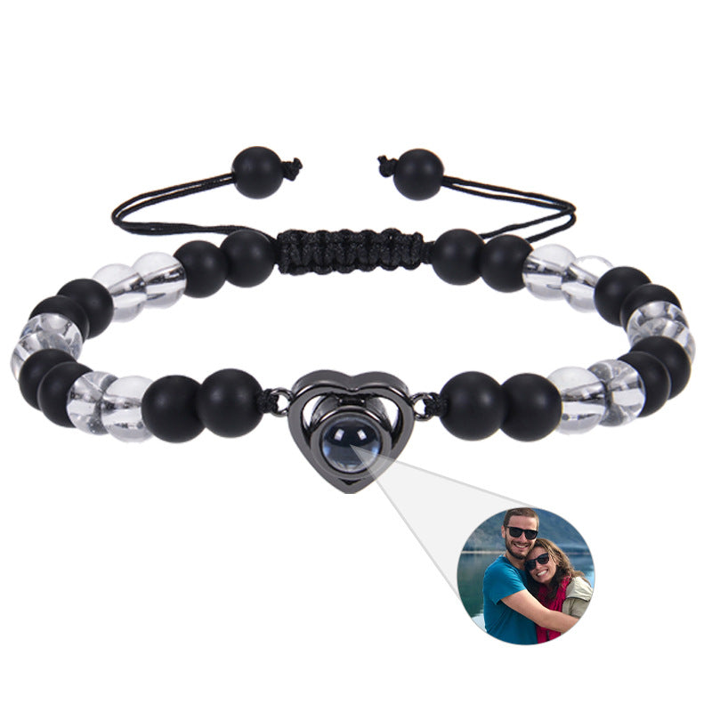 6mm black magnetic stone custom photo bracelet with matte finish and heart pendant projection.