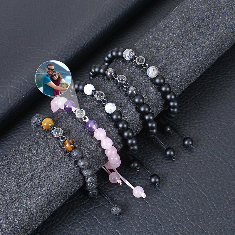 Hot-selling photo projection bracelet with 8mm volcanic stone, customizable braided design, and DIY photo personalization.