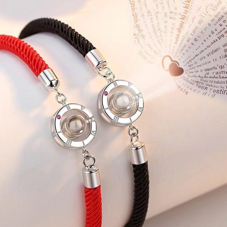 New projection couple bracelets in 100 languages say "I love you." Perfect for students and best friends!