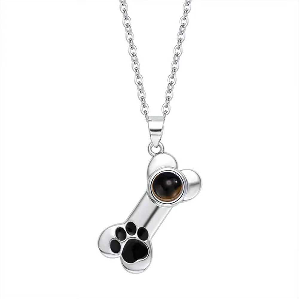 100 Languages "I Love You" projection bone necklace with dog paw design, perfect pet-themed Christmas gift.