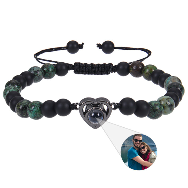 6mm black magnetic stone custom photo bracelet with matte finish and heart pendant projection.