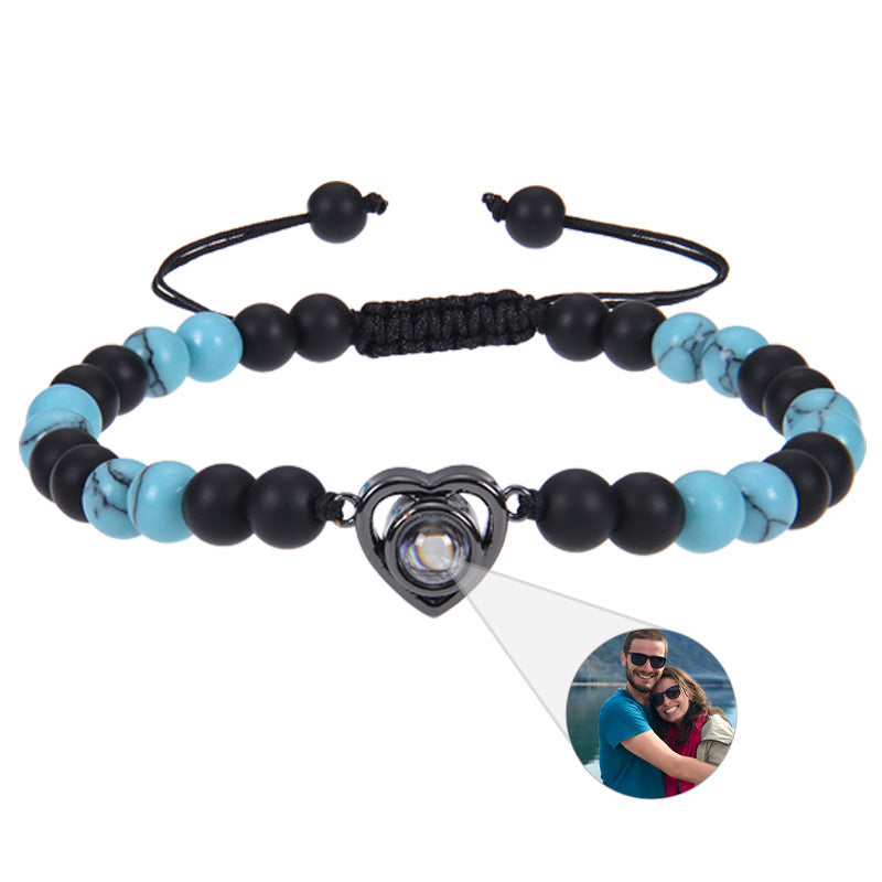 6mm black magnetic stone custom photo bracelet with matte finish and heart pendant projection.