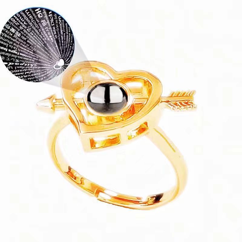New heart-piercing projection ring with "I Love You" in 100 languages, customizable photo and text, perfect for Christmas gifts.