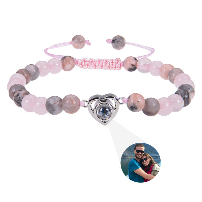 6mm black magnetic stone custom photo bracelet with matte finish and heart pendant projection.