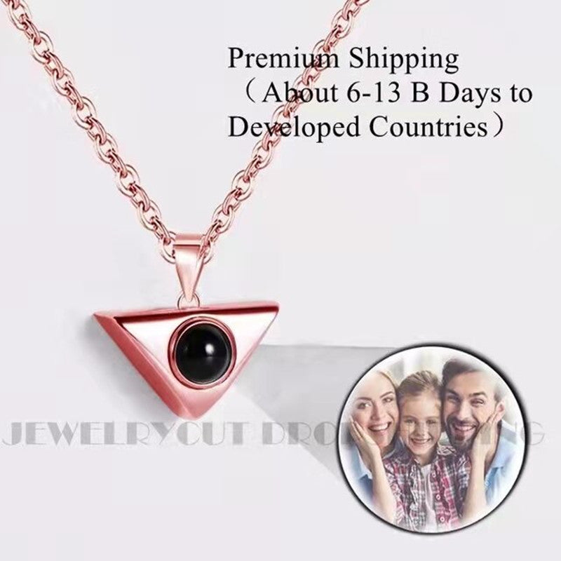 100 Languages "I Love You" Necklace with custom photo and text projection.