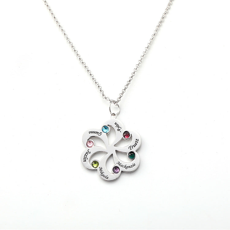 Custom silver necklace with geometric fan-shaped pendant featuring zodiac birthstones. Personalized 12 constellation jewelry. Perfect for gifting.