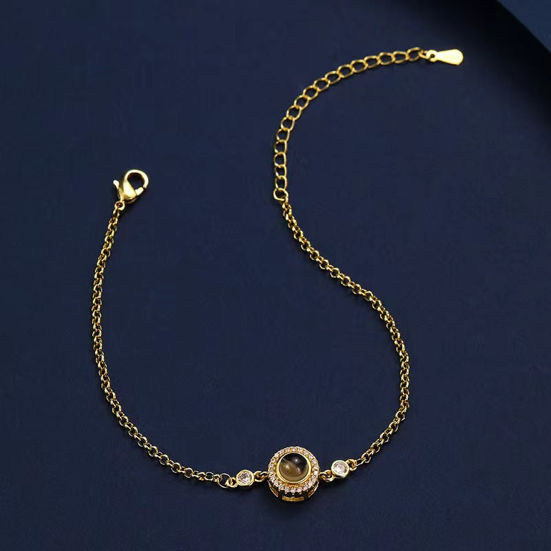 Best-selling round zirconia bracelet with "I love you" in 100 languages, featuring high-definition photo projection.