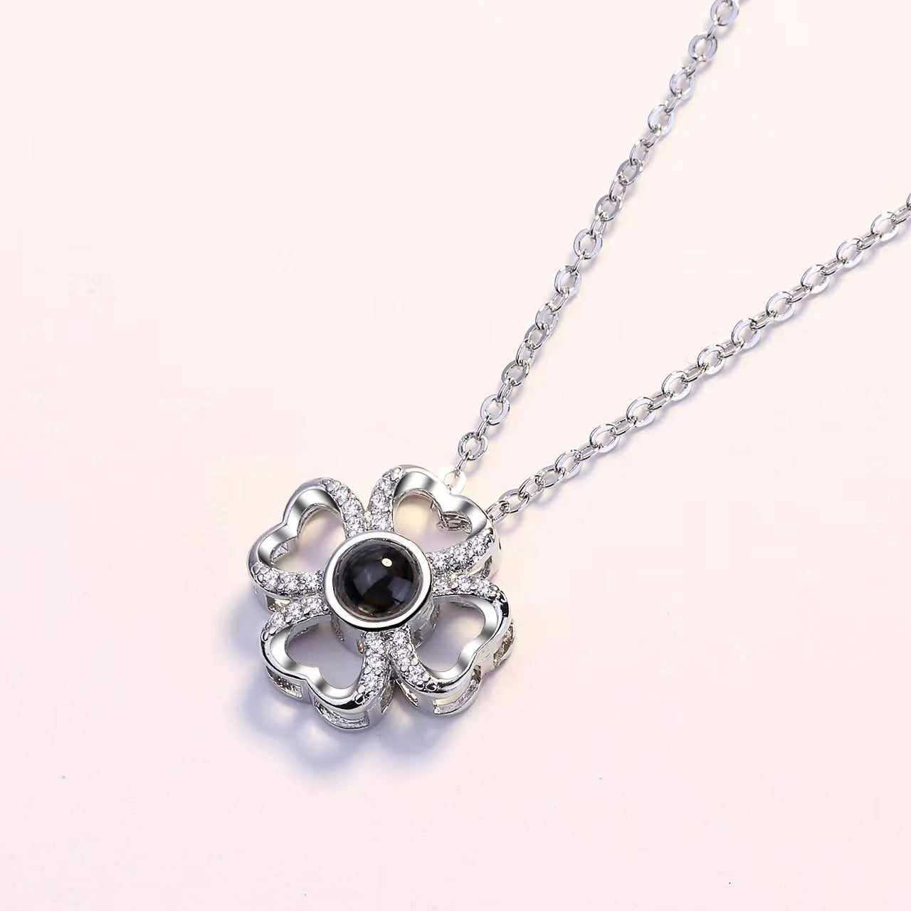100 Languages "I Love You" Projection Necklace with custom photo and text. TikTok-inspired design.