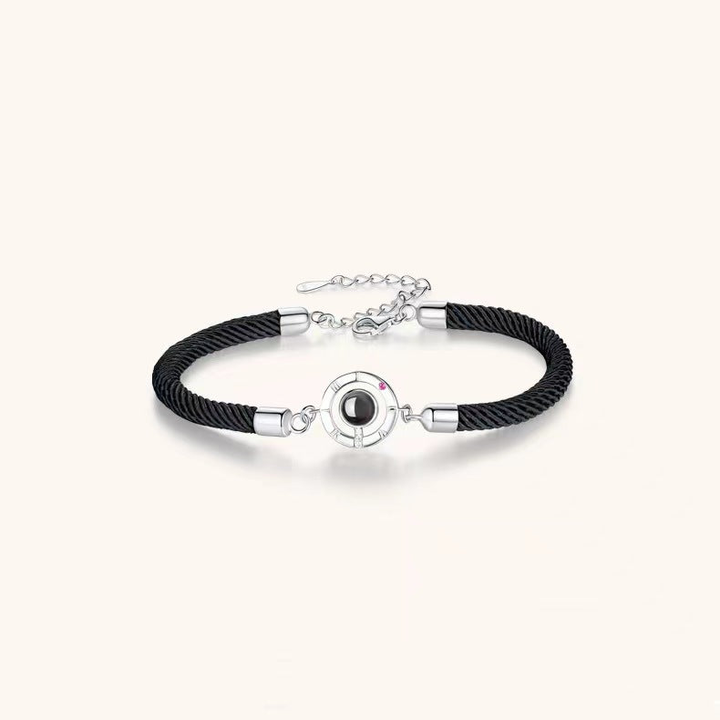 New projection couple bracelets in 100 languages say "I love you." Perfect for students and best friends!