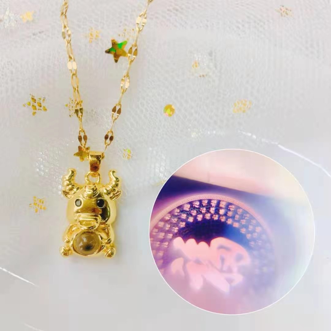 New micro-engraved titanium steel necklace for women, featuring a Taurus pendant and projection design.