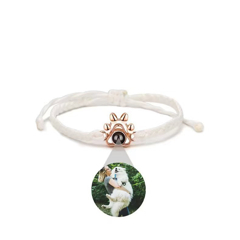 Dog paw projection bracelet for men and women, customizable with family photos and "I love you" in 100 languages.