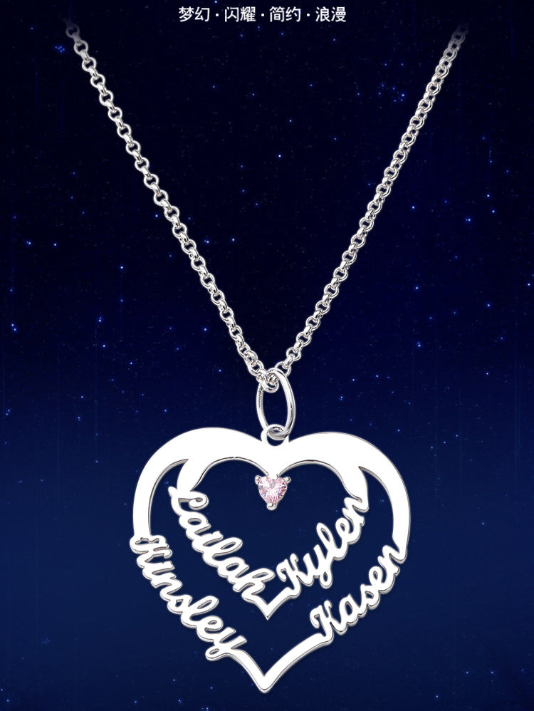 Custom geometric heart-shaped diamond necklace with creative lettering. Fashionable claw pendant on a silver chain, perfect for collarbone jewelry. Available for wholesale.