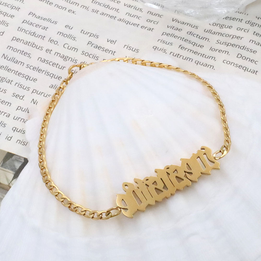 Trendy luxury titanium steel anklet for girls with Gothic-style English letter pendant.