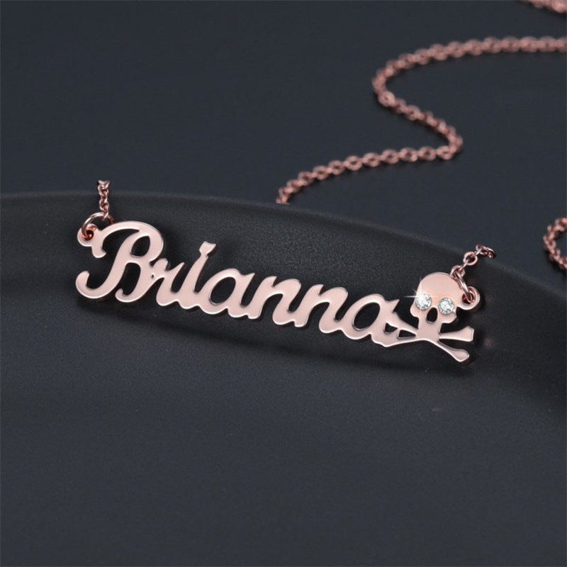 Crystal Skull Name Necklace with Pirate Design and Shimmering Eyes – Dazzling Jewelry.