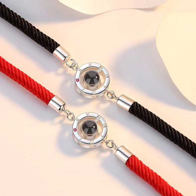 New projection couple bracelets in 100 languages say "I love you." Perfect for students and best friends!