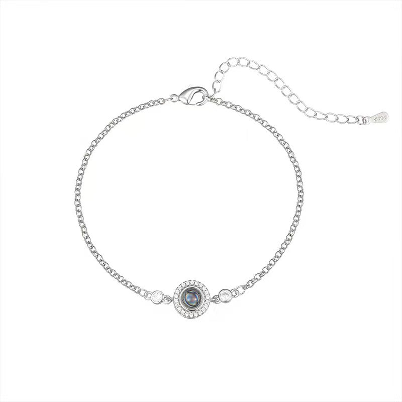Best-selling round zirconia bracelet with "I love you" in 100 languages, featuring high-definition photo projection.