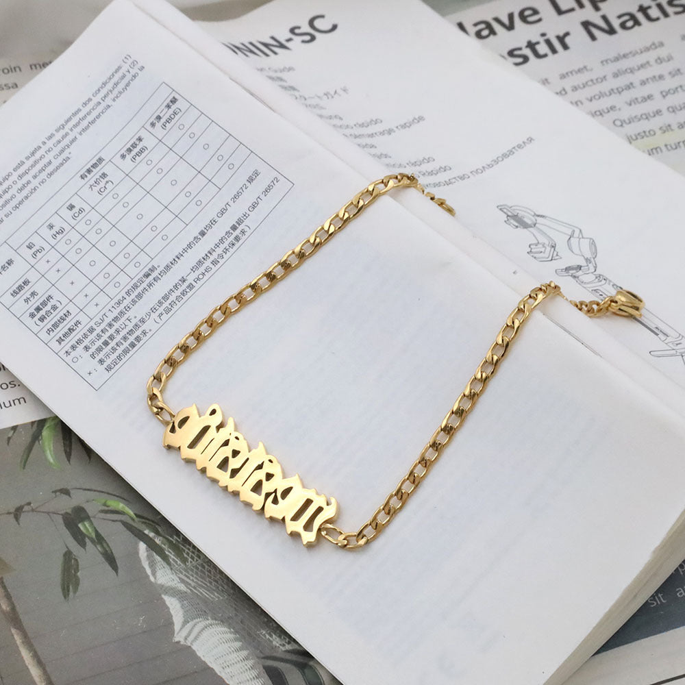 Trendy luxury titanium steel anklet for girls with Gothic-style English letter pendant.